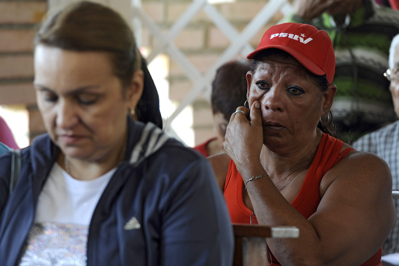 Oficialistas lloran por Chávez (FOTOS)