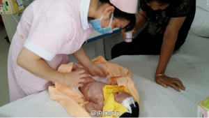 Rescatan a bebé chino que fue enterrado vivo