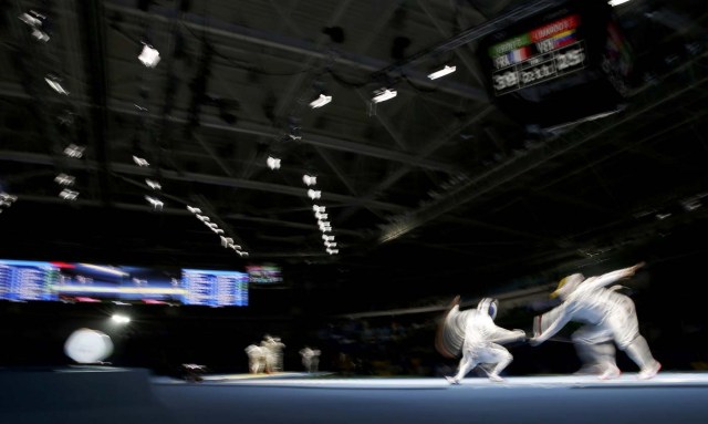 2016 Rio Olympics - Fencing - Quarterfinal - Men's Epee Team Quarterfinals - Carioca Arena 3 - Rio de Janeiro, Brazil - 14/08/2016. Daniel Jerent (FRA) of France competes with Francisco Limardo (VEN) of Venezuela. REUTERS/Issei Kato FOR EDITORIAL USE ONLY. NOT FOR SALE FOR MARKETING OR ADVERTISING CAMPAIGNS.