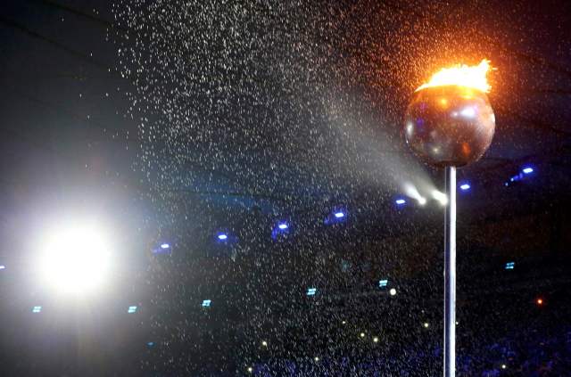 2016 Rio Olympics - Closing ceremony - Maracana - Rio de Janeiro, Brazil - 21/08/2016. The Olympic flame is pictured before being extinguished during the closing ceremony. REUTERS/Sergio Moraes FOR EDITORIAL USE ONLY. NOT FOR SALE FOR MARKETING OR ADVERTISING CAMPAIGNS.