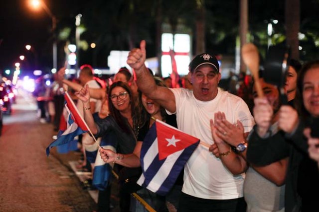 People celebrate after the announcement of the death of Cuban revolutionary leader Fidel Castro, in the Little Havana district of Miami, Florida, U.S. November 26, 2016. REUTERS/Javier Galeano