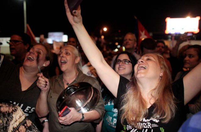 People celebrate after the announcement of the death of Cuban revolutionary leader Fidel Castro in the Little Havana district of Miami, Florida, U.S. November 26, 2016. REUTERS/Javier Galeano