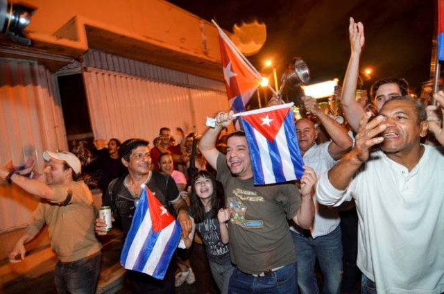 People celebrate the death of Cuban leader Fidel Castro, in Little Havana, Miami, Florida, U.S. November 26, 2016. REUTERS/Gaston De Cardenas TPX IMAGES OF THE DAY