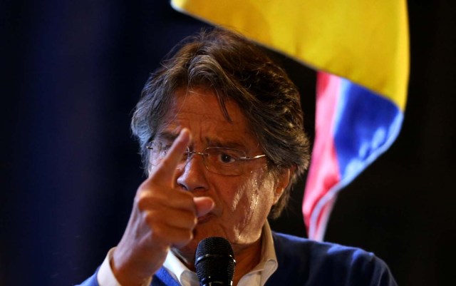 Presidential candidate Guillermo Lasso, from the CREO party gives a speech during a campaign rally in Quito, Ecuador, March 29, 2017. REUTERS/Mariana Bazo