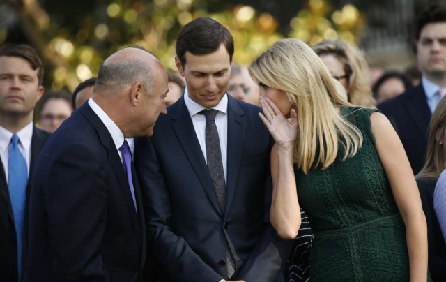 White House senior adviser Ivanka Trump talks with husband and fellow senior adviser Jared Kushner (C), and White House Chief Economic Adviser Gary Cohn prior to a moment of silence in remembrance of those lost in the September 11 attacks on the United States, at the White House in Washington, U.S., September 11, 2017. REUTERS/Kevin Lamarque