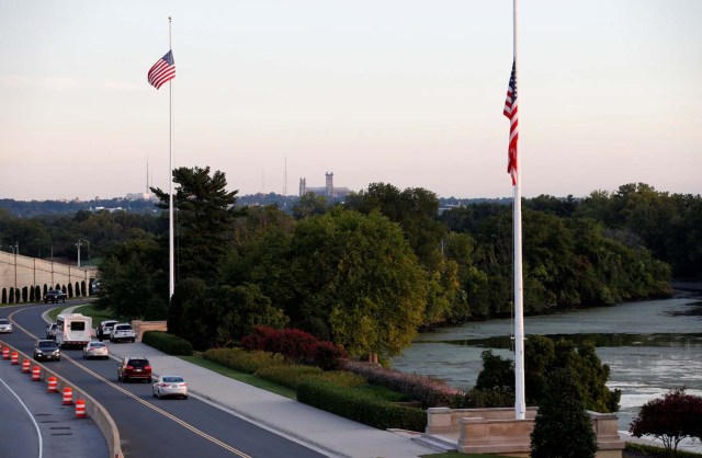 A U.S. flag is lowered to half staff marking the 16th anniversary of the September 11 attack at the Pentagon in Washington, U.S., September 11, 2017. REUTERS/Joshua Roberts