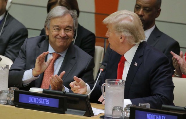 U.N. Secretary General Antonio Guterres (L) applauds after U.S. President Donald Trump spoke during a session on reforming the United Nations at U.N. Headquarters in New York, U.S., September 18, 2017. REUTERS/Lucas Jackson