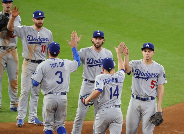 Houston, TX, USA; Los Angeles Dodgers players celebrate on the field after defeating the Houston Astros in game four of the 2017 World Series at Minute Maid Park. Mandatory Credit: Matthew Emmons-USA TODAY Sports