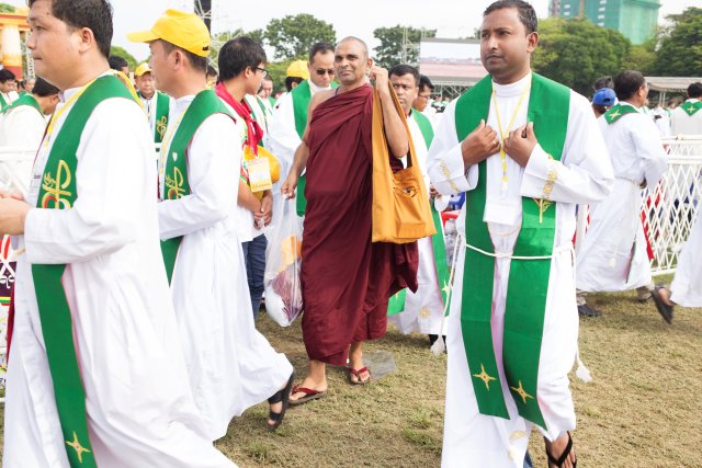 Faithful attend a mass led by Pope Francis at Kyite Ka San Football Stadium in Yangon, Myanmar November 29, 2017. REUTERS/Ann Wang NO RESALES. NO ARCHIVES.