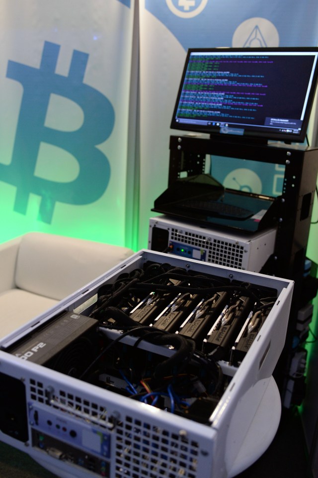 This picture shows a data miner's machine used to create Ethereum (virtual currency), at the International Science and Technology Fair (FITEC) in Caracas on December 4, 2017. Venezuela is creating a digital currency to combat a financial blockade by the United States, President Nicolas Maduro announced Sunday. / AFP PHOTO / FEDERICO PARRA