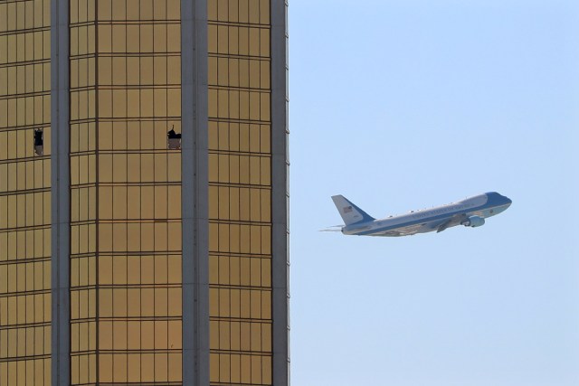 Air Force One departs Las Vegas past the broken windows on the Mandalay Bay hotel, where shooter Stephen Paddock conducted his mass shooting along the Las Vegas Strip in Las Vegas, Nevada, U.S., October 4, 2017.       REUTERS/Mike Blake/File Photo      SEARCH "POY GLOBAL" FOR THIS STORY. SEARCH "REUTERS POY" FOR ALL BEST OF 2017 PACKAGES.    TPX IMAGES OF THE DAY