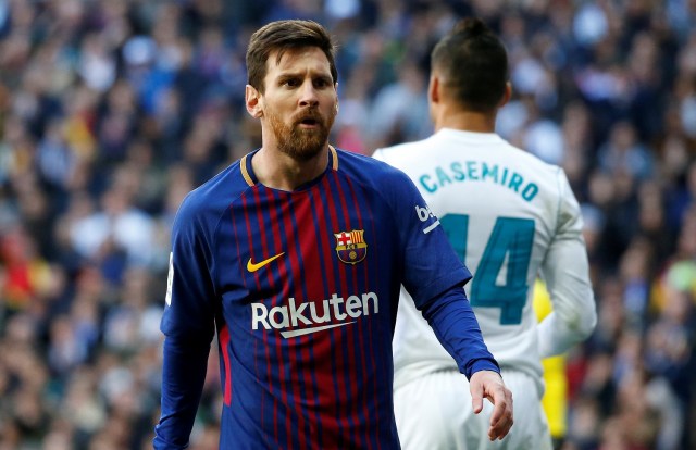Soccer Football - La Liga Santander - Real Madrid vs FC Barcelona - Santiago Bernabeu, Madrid, Spain - December 23, 2017  Barcelona’s Lionel Messi reacts  REUTERS/Stringer