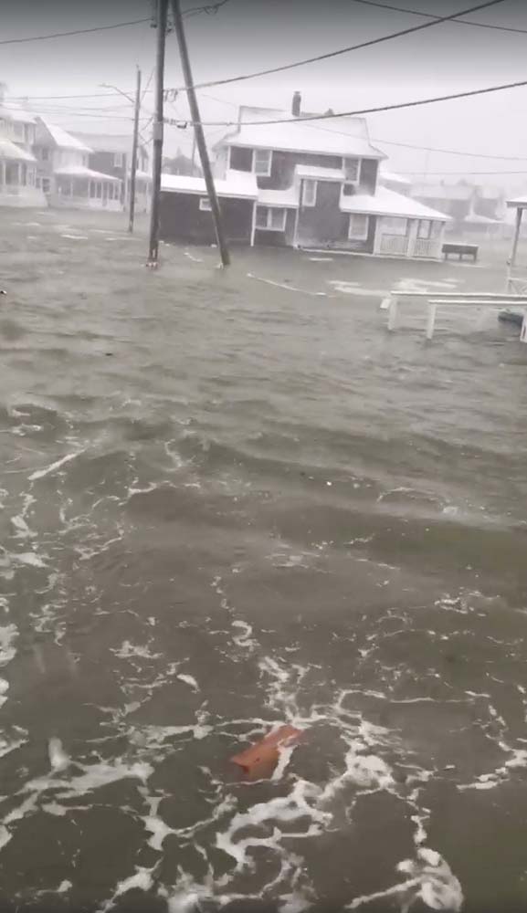 Flooded streets are seen in Scituate, Massachusetts, U.S. January 4, 2018 in this picture obtained from social media. Picture taken January 4, 2018. JILL PELO /via REUTERS THIS IMAGE HAS BEEN SUPPLIED BY A THIRD PARTY. MANDATORY CREDIT. NO RESALES. NO ARCHIVES