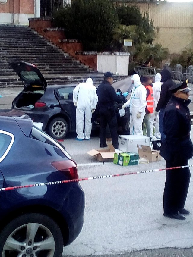 Forensics inspect a car used by a gunman in Macerata, Italy, February 3, 2018. REUTERS/Stringer   NO RESALES NO ARCHIVE