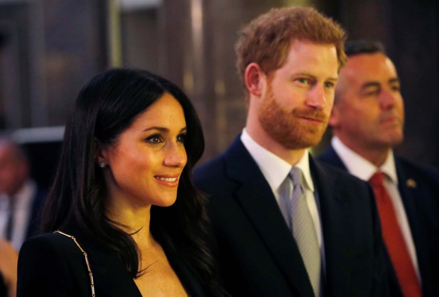 Britain's Prince Harry and Meghan Markle attend a reception celebrating the forthcoming Invictus Games Sydney 2018, hosted by Malcolm Turnbull, Prime Minister of Australia, and his wife Lucy Turnbull, at Australia House in London, Britain April 21, 2018. Alastair Grant/Pool via Reuters
