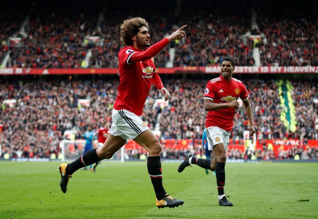 Soccer Football - Premier League - Manchester United v Arsenal - Old Trafford, Manchester, Britain - April 29, 2018   Manchester United's Marouane Fellaini celebrates scoring their second goal with Marcus Rashford   Action Images via Reuters/Carl Recine    EDITORIAL USE ONLY. No use with unauthorized audio, video, data, fixture lists, club/league logos or "live" services. Online in-match use limited to 75 images, no video emulation. No use in betting, games or single club/league/player publications.  Please contact your account representative for further details.