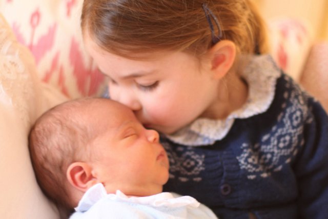 Britain's Princess Charlotte and her brother Prince Louis are seen in this photograph released by Kensington Palace, and taken by Britain's Catherine, Duchess of Cambridge, on Princess Charlotte's third birthday, at Kensington Palace in London, Britain May 2, 2018. Picture taken May 2, 2018. Catherine, Duchess of Cambridge/Courtesy of Kensington Palace/Handout via REUTERS ATTENTION EDITORS - THIS IMAGE WAS SUPPLIED BY A THIRD PARTY. MANDATORY CREDIT. NO RESALES. NO ARCHIVE. NO SALES. THIS PICTURE WAS PROCESSED BY REUTERS TO ENHANCE QUALITY. AN UNPROCESSED VERSION HAS BEEN PROVIDED SEPARATELY. TPX IMAGES OF THE DAY