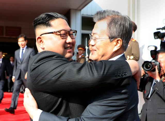 South Korean President Moon Jae-in bids fairwell to North Korean leader Kim Jong Un as he leaves after their summit at the truce village of Panmunjom, North Korea, in this handout picture provided by the Presidential Blue House on May 26, 2018. The Presidential Blue House /Handout via REUTERS ATTENTION EDITORS - THIS IMAGE WAS PROVIDED BY A THIRD PARTY